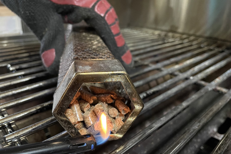 smoke tube being lighted with gas lighter