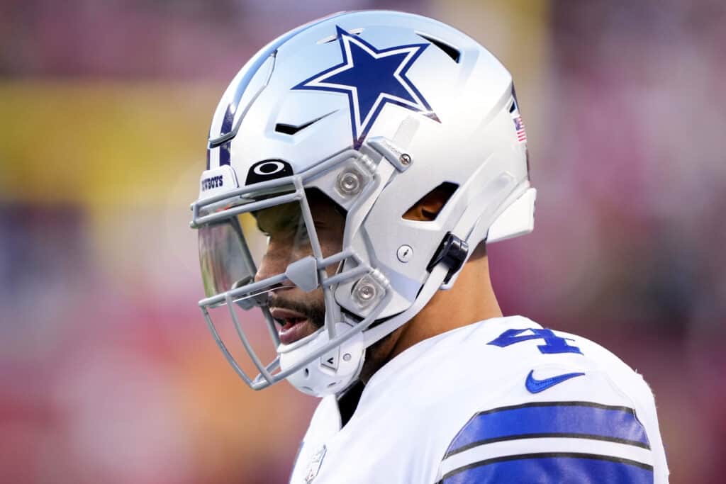 Dak Prescott #4 of the Dallas Cowboys looks on against the San Francisco 49ers during the first half in the NFC Divisional Playoff game at Levi's Stadium on January 22, 2023 in Santa Clara, California.