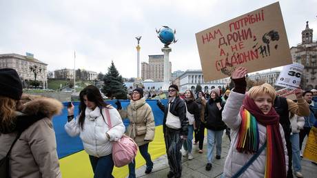 FILE PHOTO: Protesters in Kiev demand more military spending.