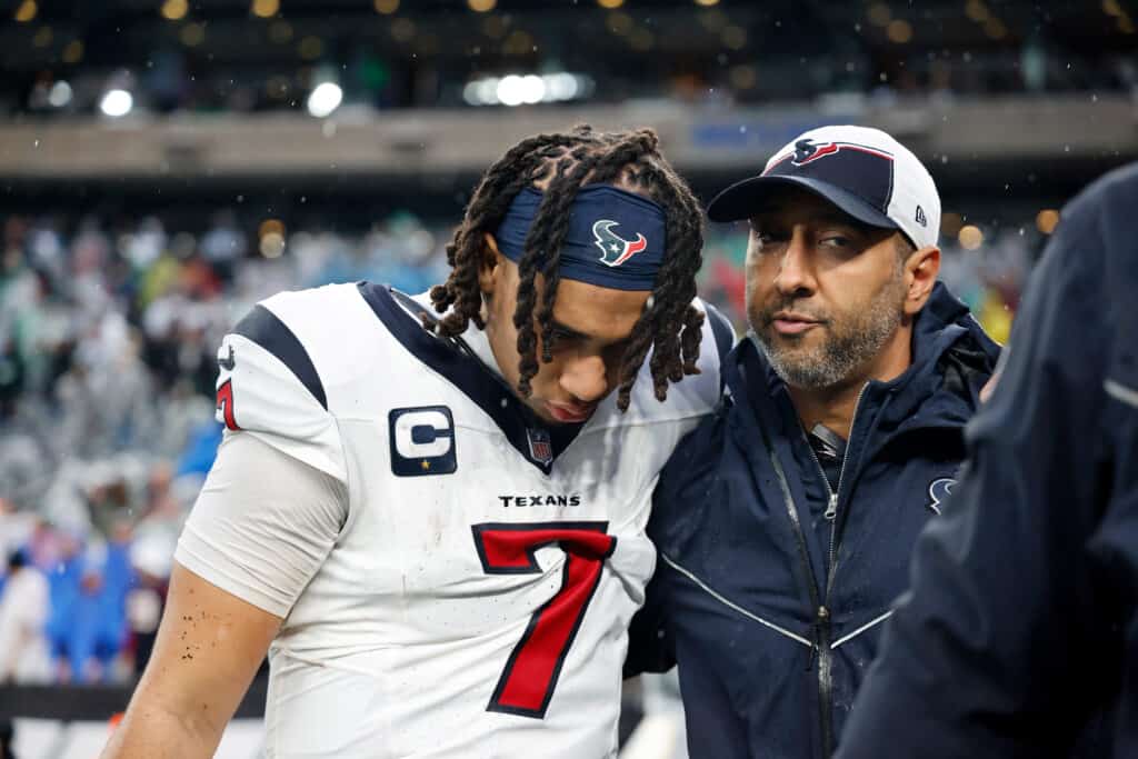 EAST RUTHERFORD, NEW JERSEY - DECEMBER 10: C.J. Stroud #7 of the Houston Texans walks off the field with an injury during the second half in the game against the New York Jets at MetLife Stadium on December 10, 2023 in East Rutherford, New Jersey.