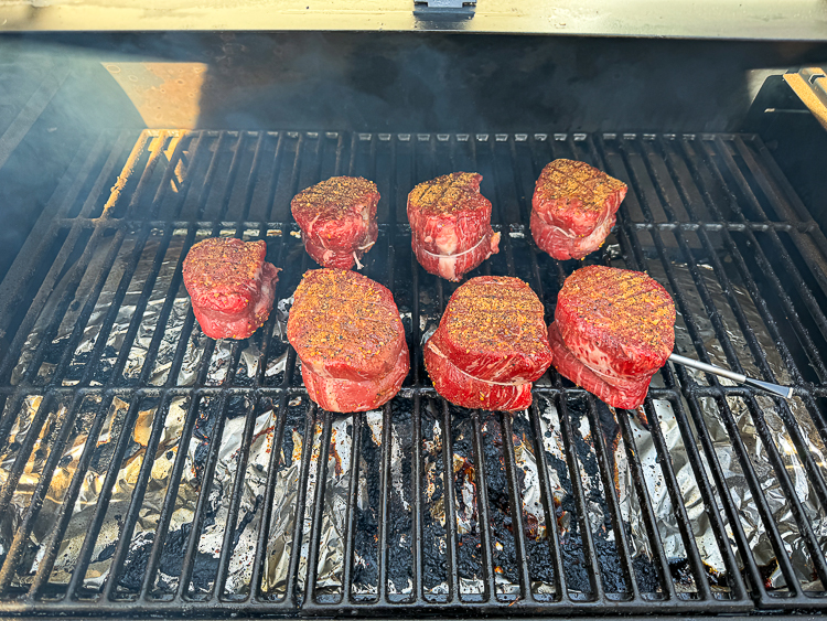 raw filet mignon on the smoker