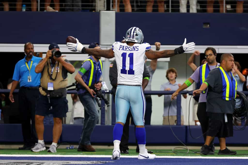 Micah Parsons #11 of the Dallas Cowboys reacts to a play during the third quarter against the New York Jets at AT&T Stadium on September 17, 2023 in Arlington, Texas.