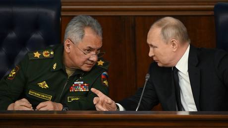 Russian Defense Minister Sergei Shoigu and President Vladimir Putin at a Defense Ministry meeting on December 19, 2023.