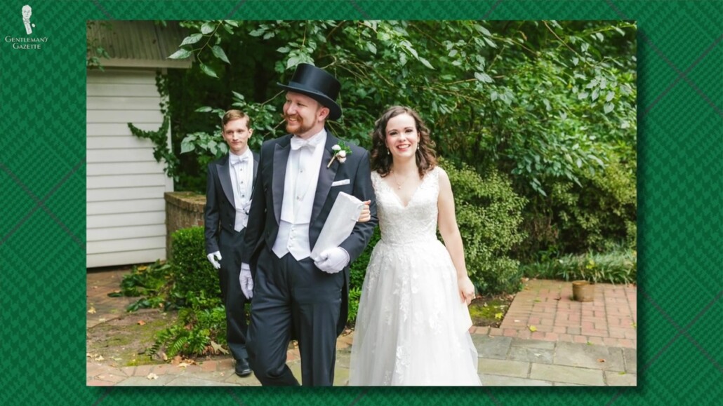 Eb wearing the right hat at his wedding reception