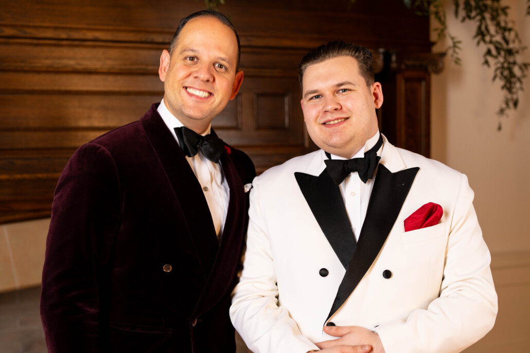 Two men wearing bold Black Tie jackets