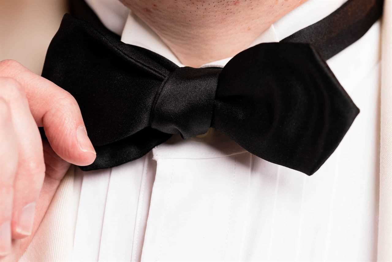 Close up photo of a black diamond ended bow tie