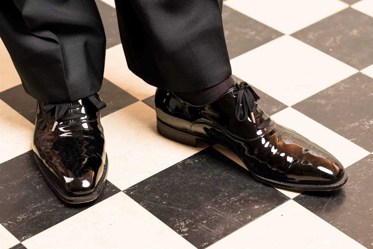 Photo of patent leather oxfords worn with a pair of evening socks