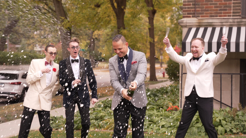 Photo as Raphael pops bottle of champagne Black Tie