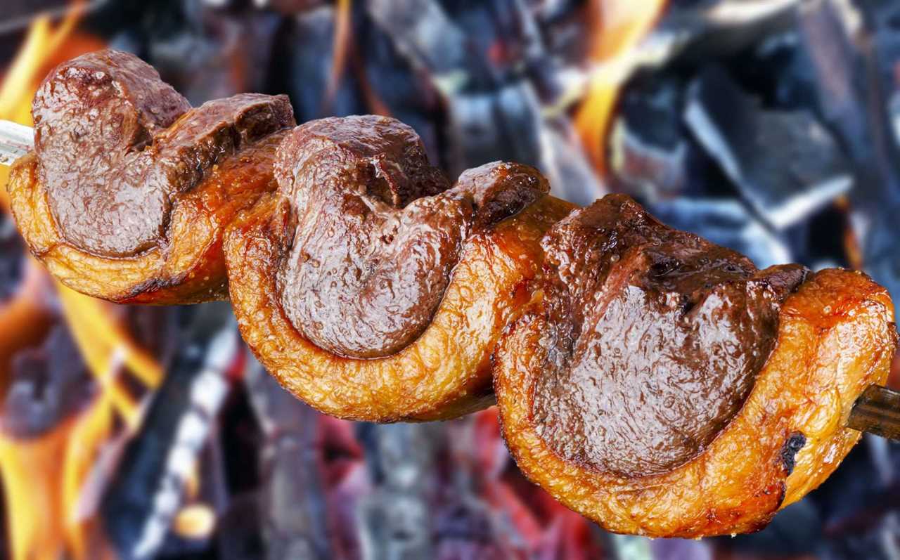 picanha-steak-on-skewer-over-fire