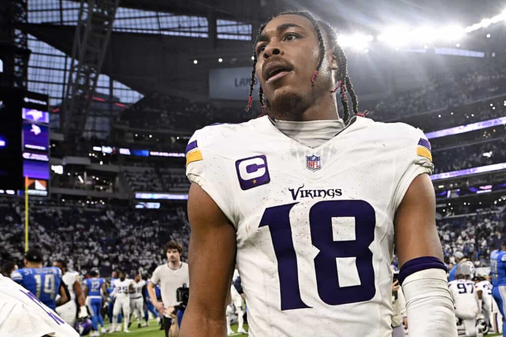 MINNEAPOLIS, MINNESOTA - DECEMBER 24:  Justin Jefferson #18 of the Minnesota Vikings reacts after the team's 30-24 loss against the Detroit Lions at U.S. Bank Stadium on December 24, 2023 in Minneapolis, Minnesota.