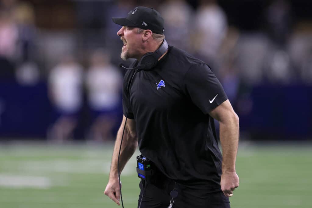 ARLINGTON, TEXAS - DECEMBER 30: Head coach Dan Campbell of the Detroit Lions reacts to a penalty during a two point conversion attempt against the Dallas Cowboys during the fourth quarter in the game at AT&T Stadium on December 30, 2023 in Arlington, Texas.