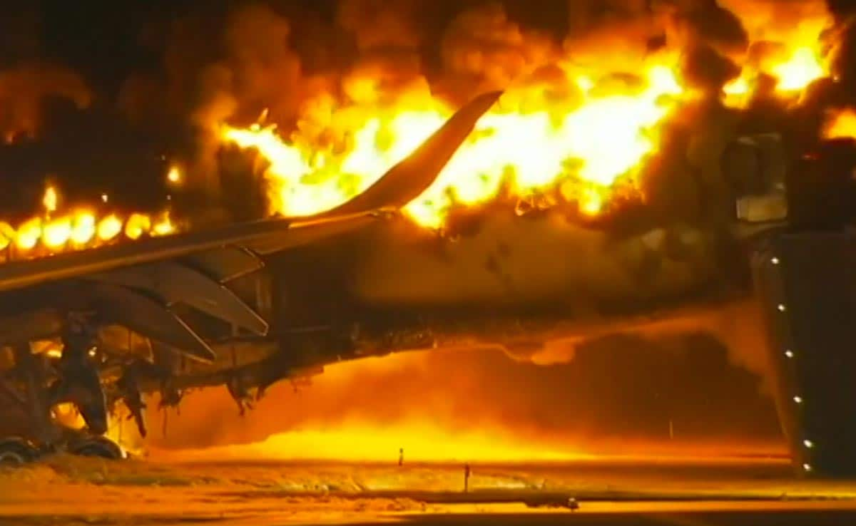 The plane seen in orange flames