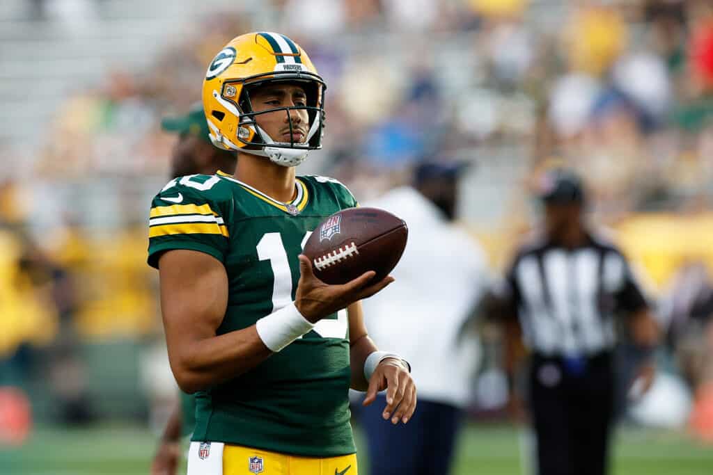 Jordan Love #10 of the Green Bay Packers warms up before the game against the New England Patriots during a preseason game at Lambeau Field on August 19, 2023 in Green Bay, Wisconsin.