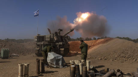 An Israeli mobile artillery unit fires a shell from southern Israel towards Gaza, in a position near the Israel-Gaza border, November 6, 2023