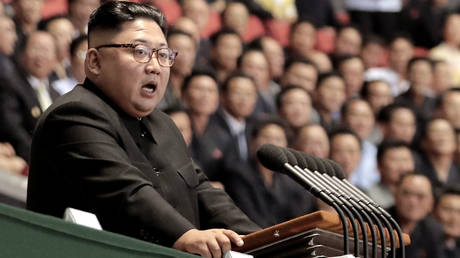 North Korean leader Kim Jong Un speaks after watch the gymnastic and artistic performance at the May Day Stadium on September 19, 2018 in Pyongyang, North Korea