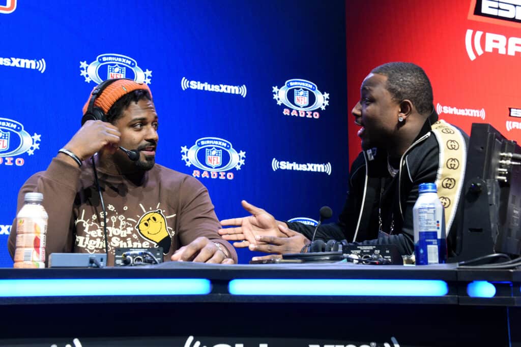 LOS ANGELES, CALIFORNIA - FEBRUARY 11: (L-R) Cameron Jordan of the New Orleans Saints and former NFL player LeSean McCoy speak during an interview on day 3 of SiriusXM At Super Bowl LVI on February 11, 2022 in Los Angeles, California. (Photo by Vivien 