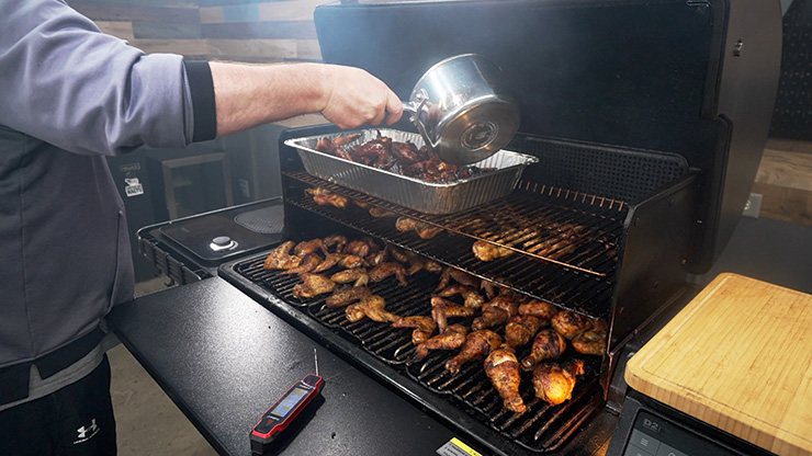 chicken wings smoking on the Traeger Timberline pellet smoker