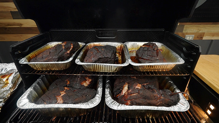 pork butts smoking on the Traeger Timberline XL pellet grill