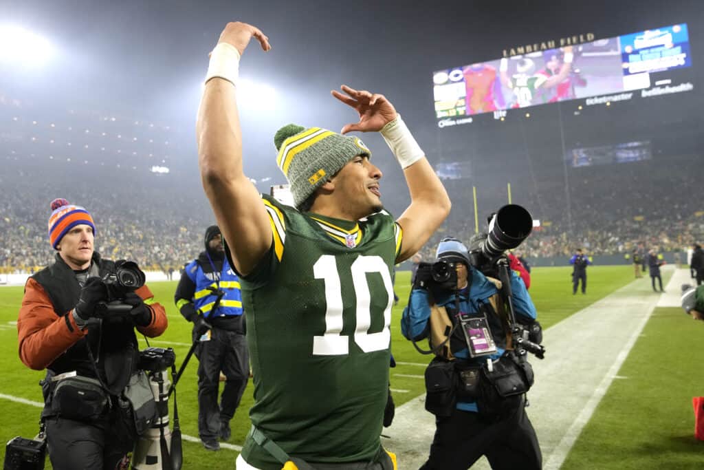 GREEN BAY, WISCONSIN - JANUARY 07: Jordan Love #10 of the Green Bay Packers walks off the field after a win over the Chicago Bears at Lambeau Field on January 07, 2024 in Green Bay, Wisconsin. 