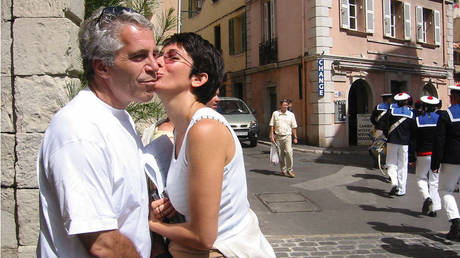 This undated trial evidence image obtained December 8, 2021, from the US District Court for the Southern District of New York shows British socialite Ghislaine Maxwell and US financier Jeffrey Epstein