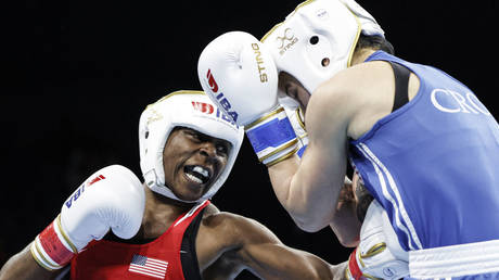 FILE PHOTO: Shakilya Rashida Ellis (red) of USA fights Marija Malenica (blue) of Croatia during a women's 54 kg match at the Internatinal Boxing Association Women's World Boxing Championships 2022 in Istanbul, Turkiye, May 12, 2022