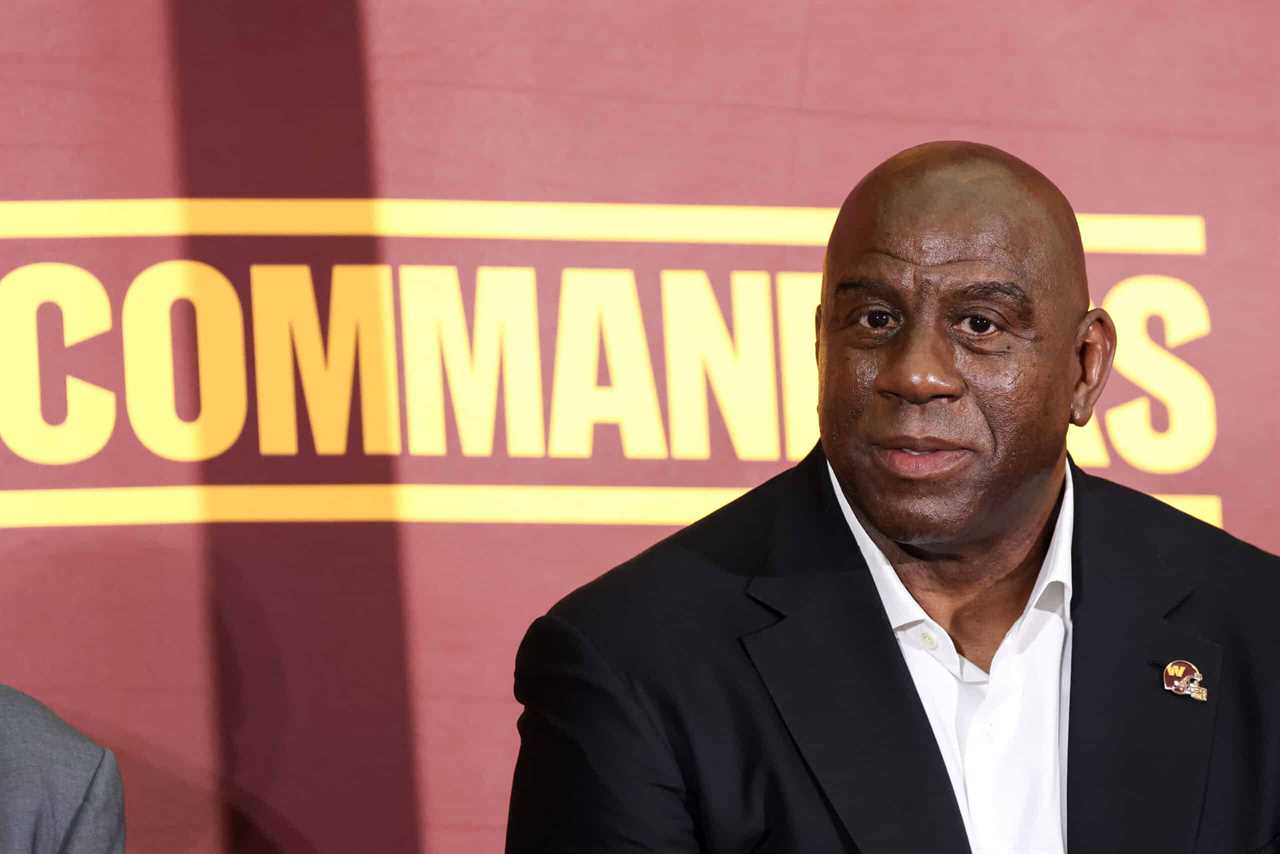 Earvin 'Magic' Johnson, a new owner of the Washington Commanders, looks on during a press conference introducing the team's new ownership at FedExField on July 21, 2023 in Landover, Maryland. NFL teams owners have unanimously approved a $6.05 billion sale of the Commanders from Dan Snyder to a group led by Josh Harris.