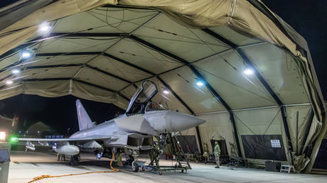 An RAF Typhoon aircraft returns to berth following a strike mission on Yemen’s Houthis at RAF Akrotiri on January 12, 2024 in Akrotiri, Cyprus.