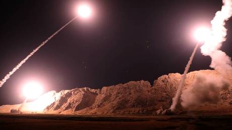 FILE PHOTO: Islamic Revolutionary Guard Corps launch missiles into Syria