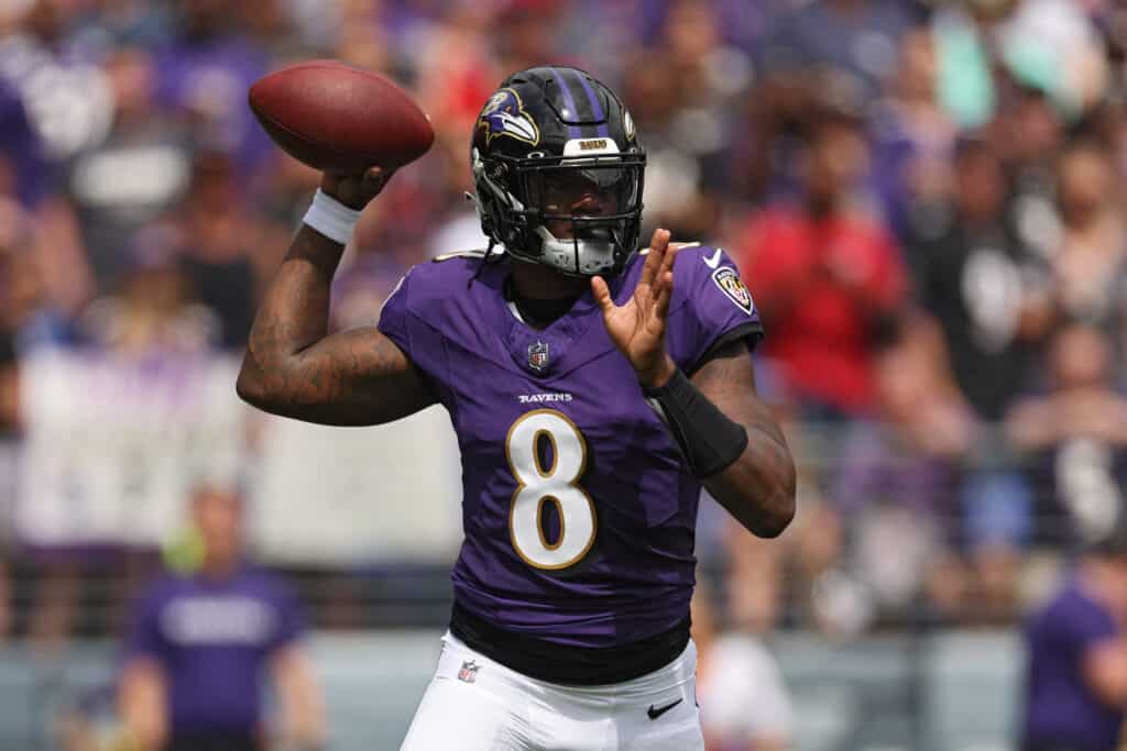 Quarterback Lamar Jackson #8 of the Baltimore Ravens passes the ball against the Houston Texans at M&T Bank Stadium on September 10, 2023 in Baltimore, Maryland.