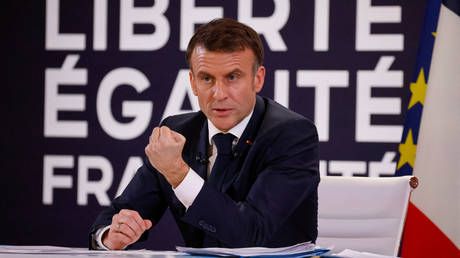 France's President Emmanuel Macron gestures as he speaks during a press conference at The Elysee Palace in Paris on January 16, 2024.