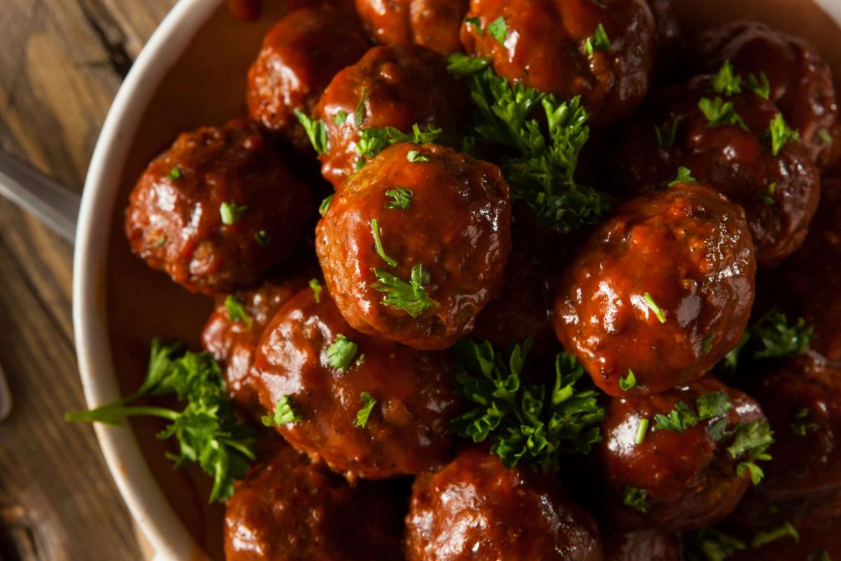 Smoked BBQ Meatballs in a bowl with garnish