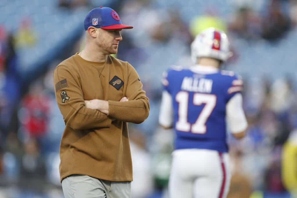 ORCHARD PARK, NEW YORK - NOVEMBER 19: Interim offensive coordinator Joe Brady looks on before the game against the New York Jets at Highmark Stadium on November 19, 2023 in Orchard Park, New York.