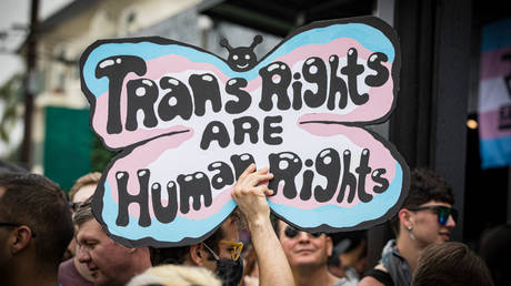 A sign seen at a transgender pride march in San Diego, California, June 18, 2023