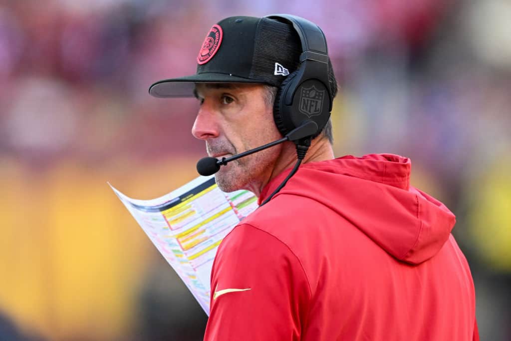 Head coach Kyle Shanahan of the San Francisco 49ers looks on during the fourth quarter of a game against the Washington Commanders at FedExField on December 31, 2023 in Landover, Maryland.