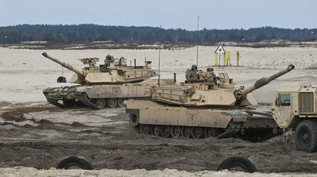 FILE PHOTO. US soldiers train with M1A2 Abrams tanks in Nowa Deba, Poland.