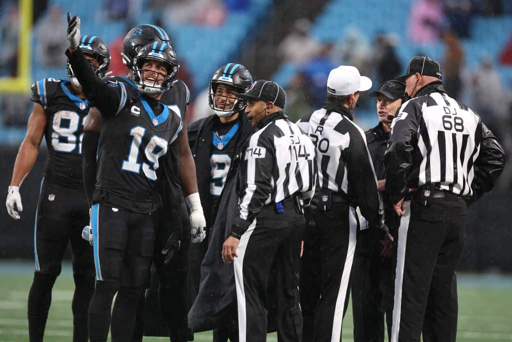 Interim head coach Chris Tabor of the Carolina Panthers argues with the ...