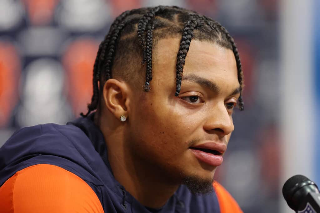 Justin Fields #1 of the Chicago Bears speaks to the media during minicamp at Halas Hall on June 15, 2023 in Lake Forest, Illinois.