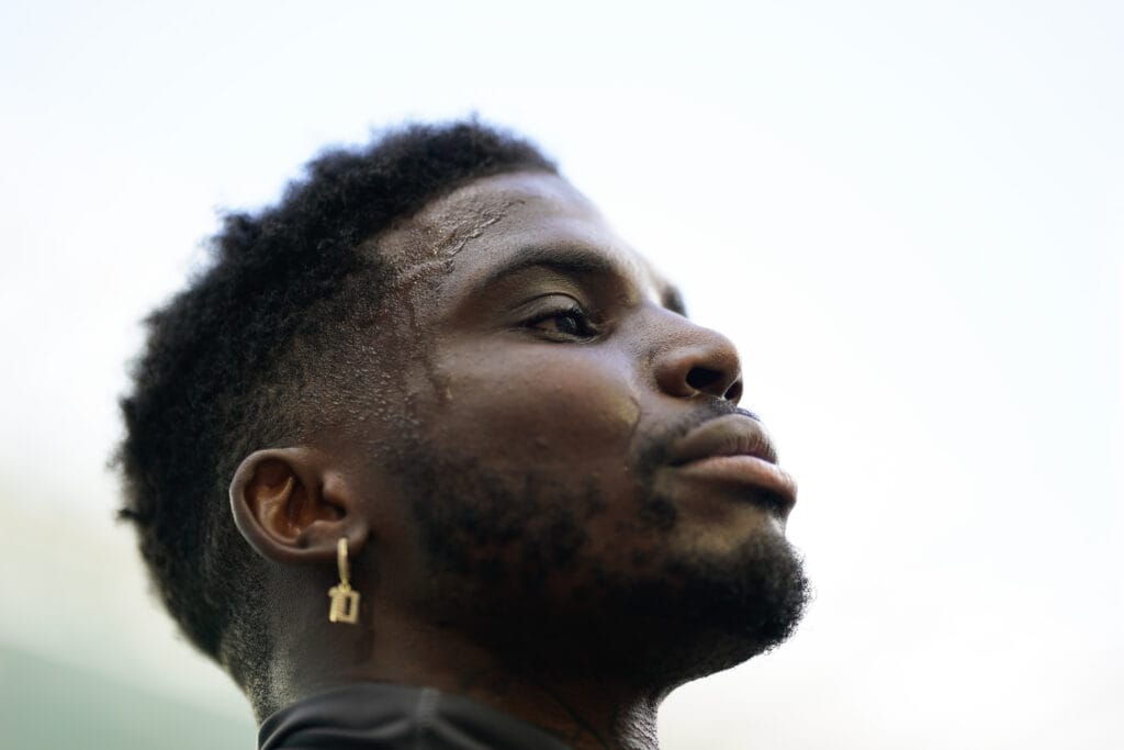 MIAMI GARDENS, FLORIDA - DECEMBER 17: Tyreek Hill #10 of the Miami Dolphins warms up prior to a game against the New York Jets at Hard Rock Stadium on December 17, 2023 in Miami Gardens, Florida.