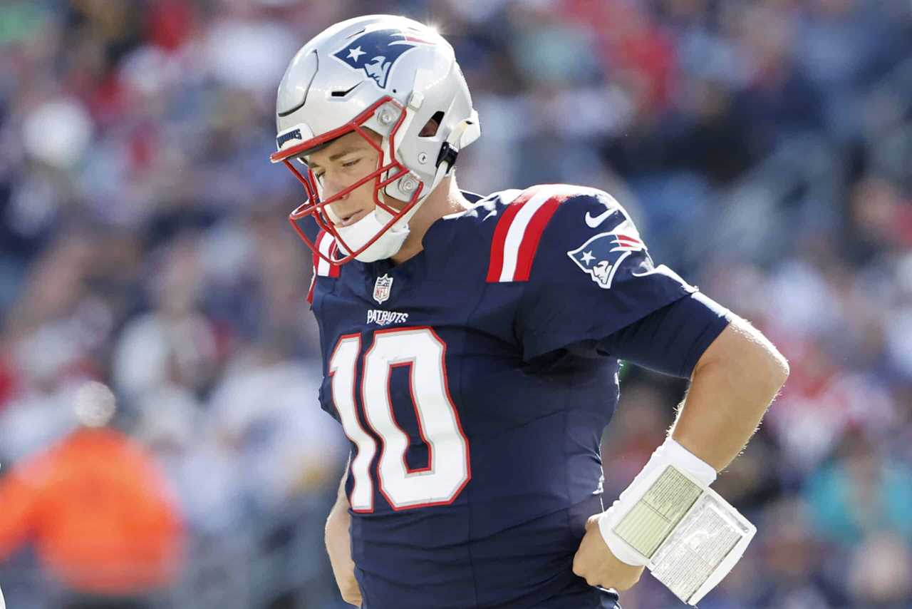 Mac Jones #10 of the New England Patriots looks on during the second quarter against the New Orleans Saints at Gillette Stadium on October 08, 2023 in Foxborough, Massachusetts