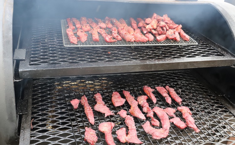 beef jerky in a smoker