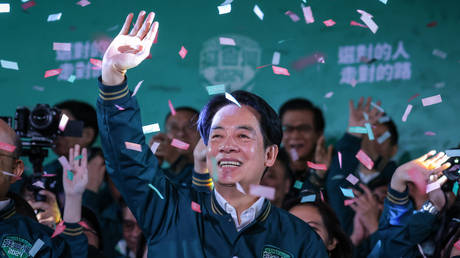 Confetti flies over the stage and crowd as Taiwan's Vice President and presidential-elect from the Democratic Progressive Party (DPP) Lai Ching-te speaks to supporters at a rally at the party's headquarters on January 13, 2024 in Taipei, Taiwan.