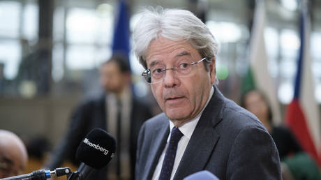 FILE PHOTO: EU Commissioner for Economy Paolo Gentiloni is talking to media prior an Eurogroup meeting in the Europa building, the EU Council headquarter on January 15, 2024 in Brussels, Belgium.