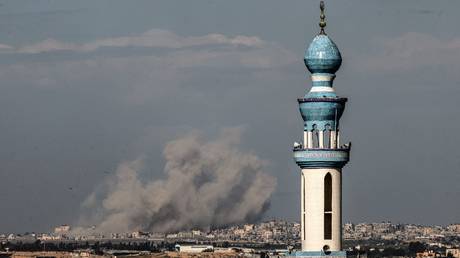 Smoke billowing during Israeli bombardment over Khan Yunis in the southern Gaza Strip on February 10, 2024.