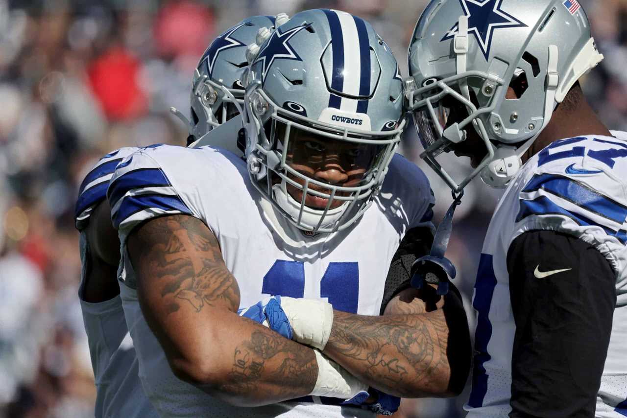 Micah Parsons #11 of the Dallas Cowboys celebrates after sacking Trevor Lawrence #16 of the Jacksonville Jaguars during the first quarter of the game at TIAA Bank Field on December 18, 2022 in Jacksonville, Florida.