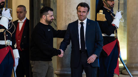 President Emmanuel Macron welcomes Ukrainian President Vladimir Zelensky to the Elysee Palace, 14 May 2023.