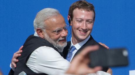 Indian Prime Minister Narendra Modi (L) and Facebook CEO Mark Zuckerberg hug after a Townhall meeting, at Facebook headquarters in California in 2015.