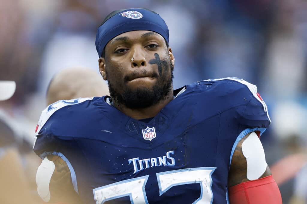 NASHVILLE, TENNESSEE - NOVEMBER 26: Derrick Henry #22 of the Tennessee Titans looks on during the first half against the Carolina Panthers at Nissan Stadium on November 26, 2023 in Nashville, Tennessee. 