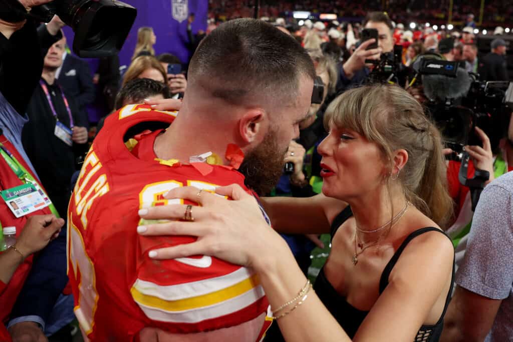 LAS VEGAS, NEVADA - FEBRUARY 11: Travis Kelce #87 of the Kansas City Chiefs kisses Taylor Swift after defeating the San Francisco 49ers 2 during Super Bowl LVIII at Allegiant Stadium on February 11, 2024 in Las Vegas, Nevada.
