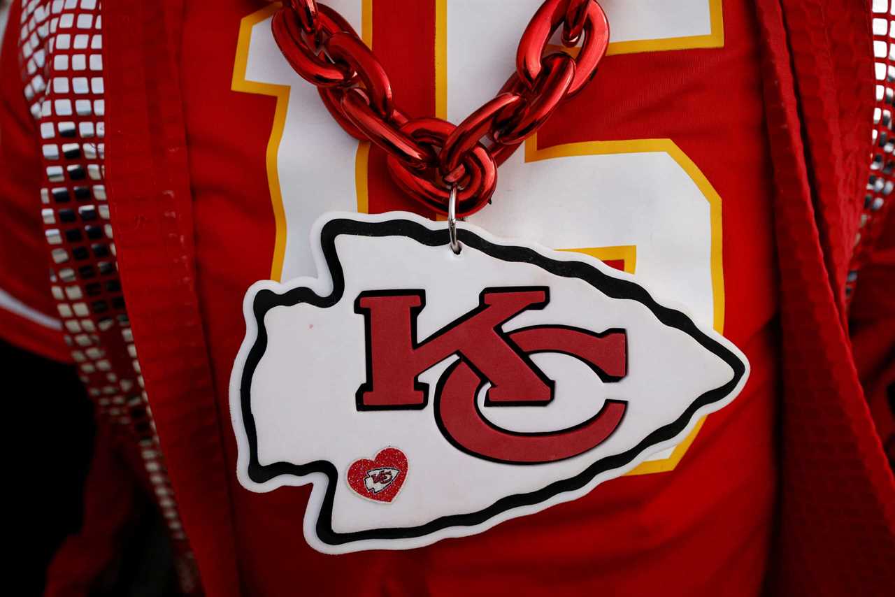 KANSAS CITY, MISSOURI - JANUARY 29: A detailed view of the Kansas City Chiefs logo on a fan prior to the AFC Championship Game against the Cincinnati Bengals at GEHA Field at Arrowhead Stadium on January 29, 2023 in Kansas City, Missouri.