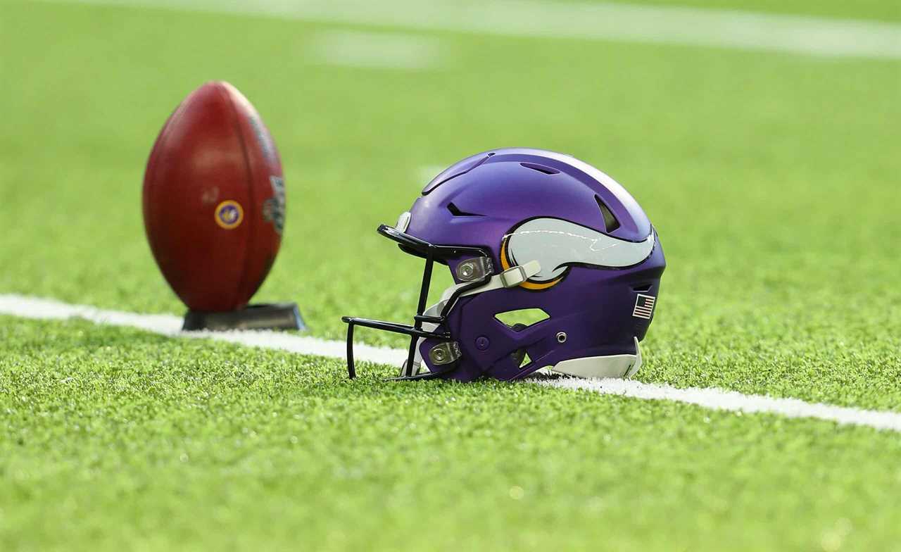 A Minnesota Vikings helmet and ball on the field before the preseason game against the Seattle Seahawks at U.S. Bank Stadium on August 18, 2019 in Minneapolis, Minnesota.